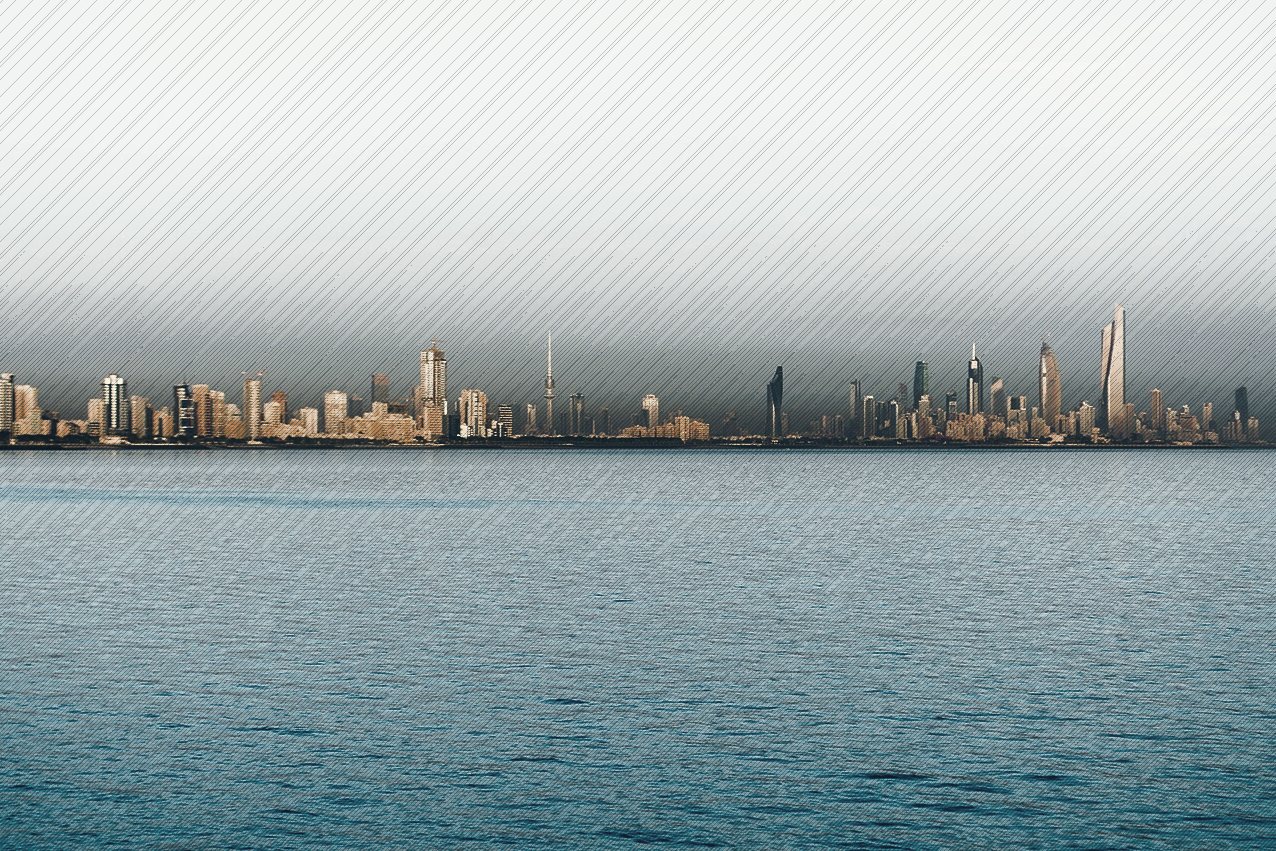 The skyline of Kuwait City seen across the water of the Gulf