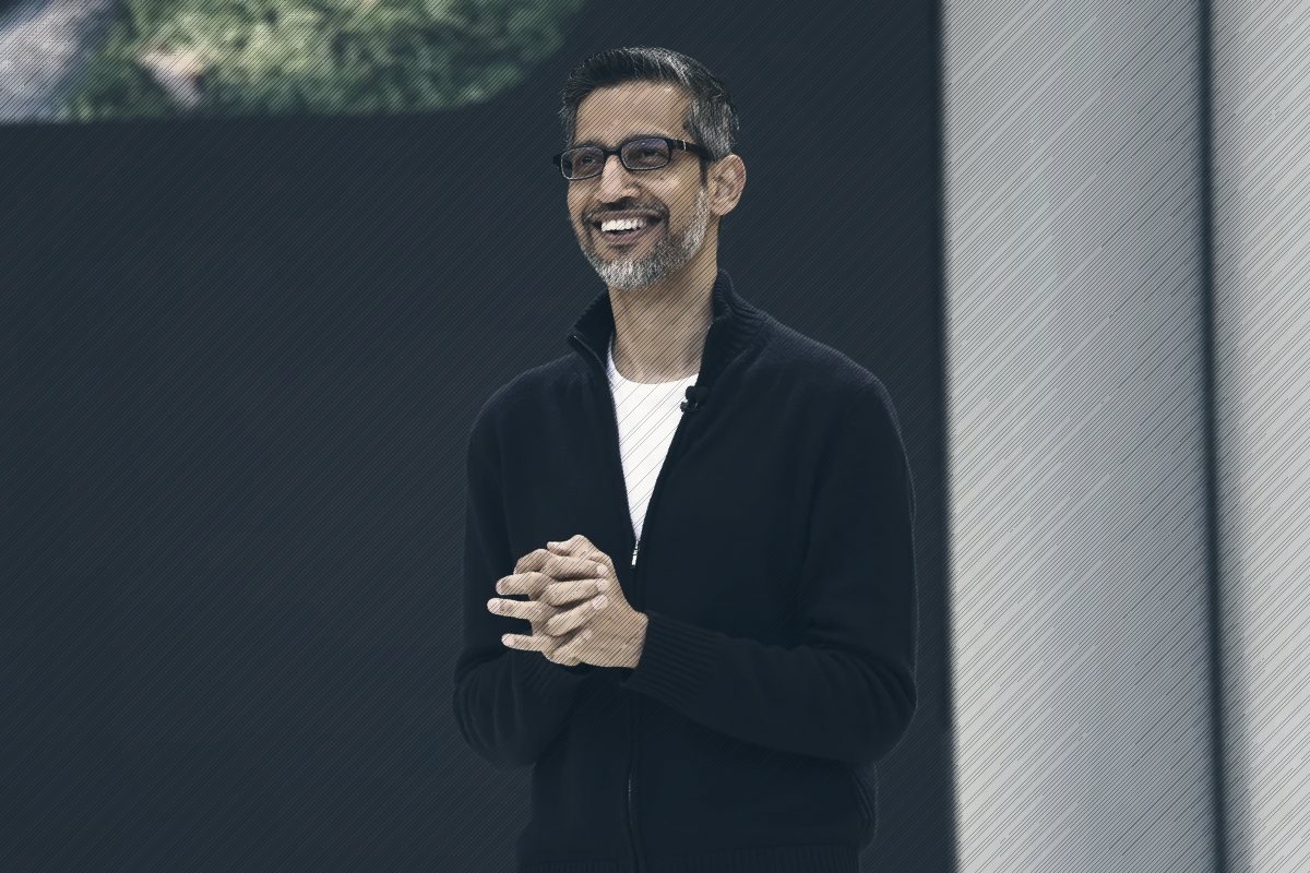 Sundar Pichai, chief executive of Alphabet and Google, smiling on stage